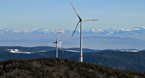 Zu sehen ist ein Windpark, die Ausschreibung der Windenergie an Land ist erneut unterzeichnet.
