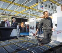 Zu sehen ist eine Impression von einer Photovoltaik-Messe Solar Solutions Niederlande. Die Solar Solutions Düsseldorf ist ein logischer Schritt zur Internationalisierung.