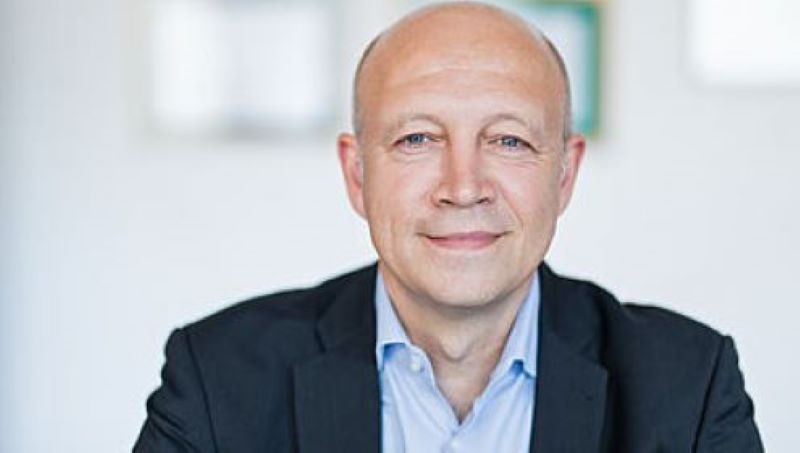 Portrait von Andreas Kuhlmann, Vorsitzender der Geschäftsführung der Deutschen Energie-Agentur (dena)